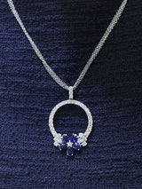 Blue Sapphire & Diamonds Circle Pendant with a flower