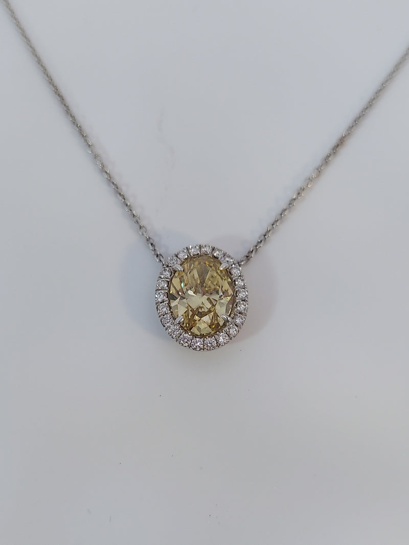 Fancy Yellow Oval Cut Diamond Halo Pendant