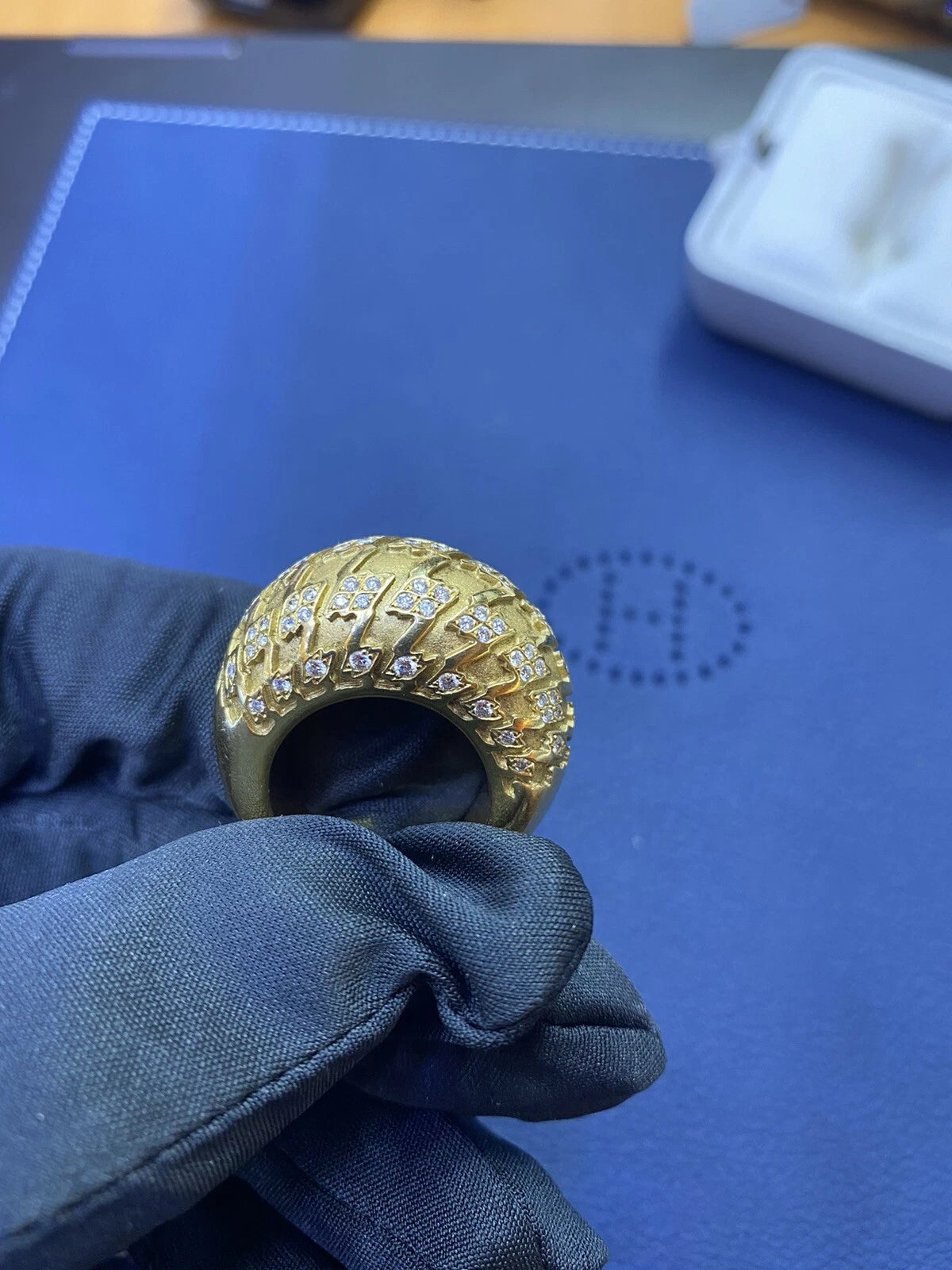 Christian Dior diamond gold houndstooth dome ring detail view